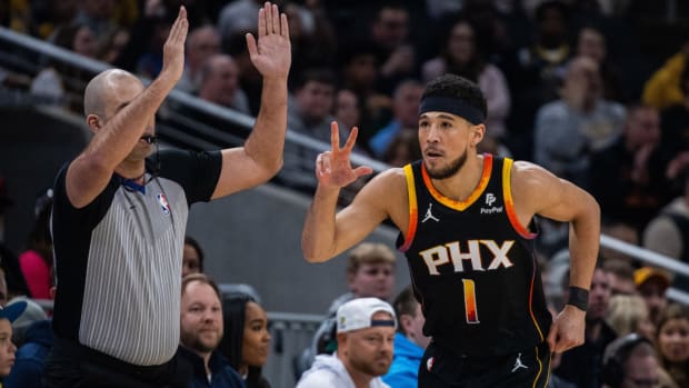 Phoenix Suns guard Devin Booker (1) celebrates a made basket in the first half against the Indiana Pacers at Gainbridge Fieldhouse.